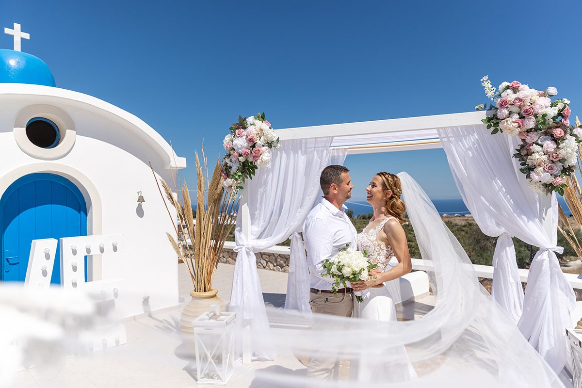 Ceremony gazebo at the blue-domed Saint Nicholas chapel