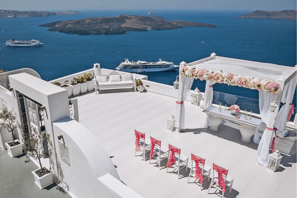 Firostefani terrace venue stepping down towards the caldera