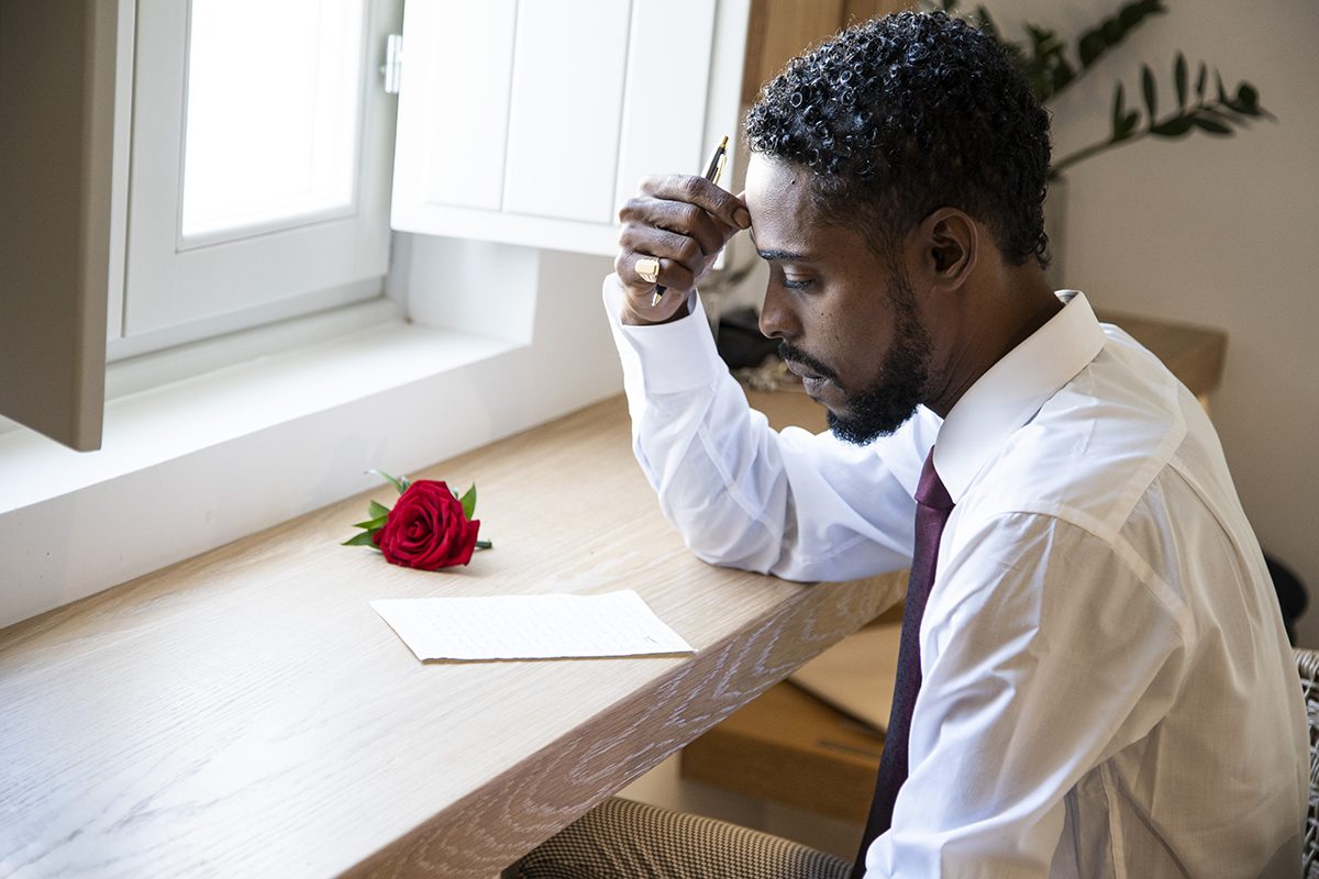 Groom preparing on the morning of the wedding