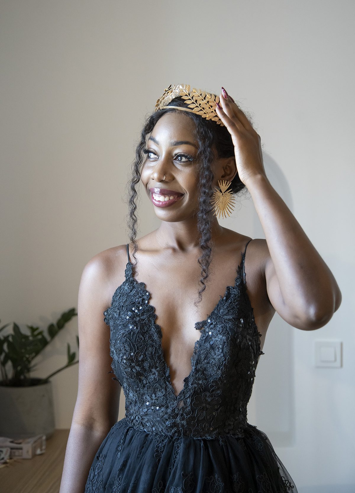 Bride in a black gown wearing a crown