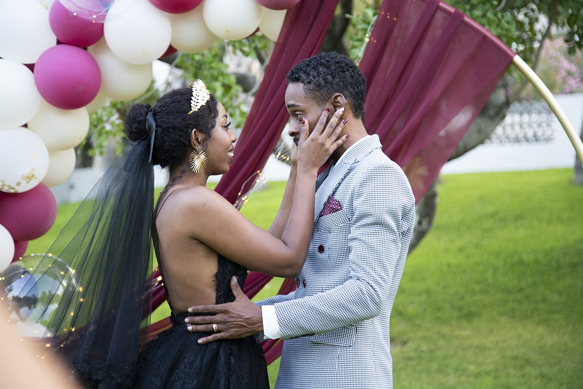 Couple embracing after their ceremony