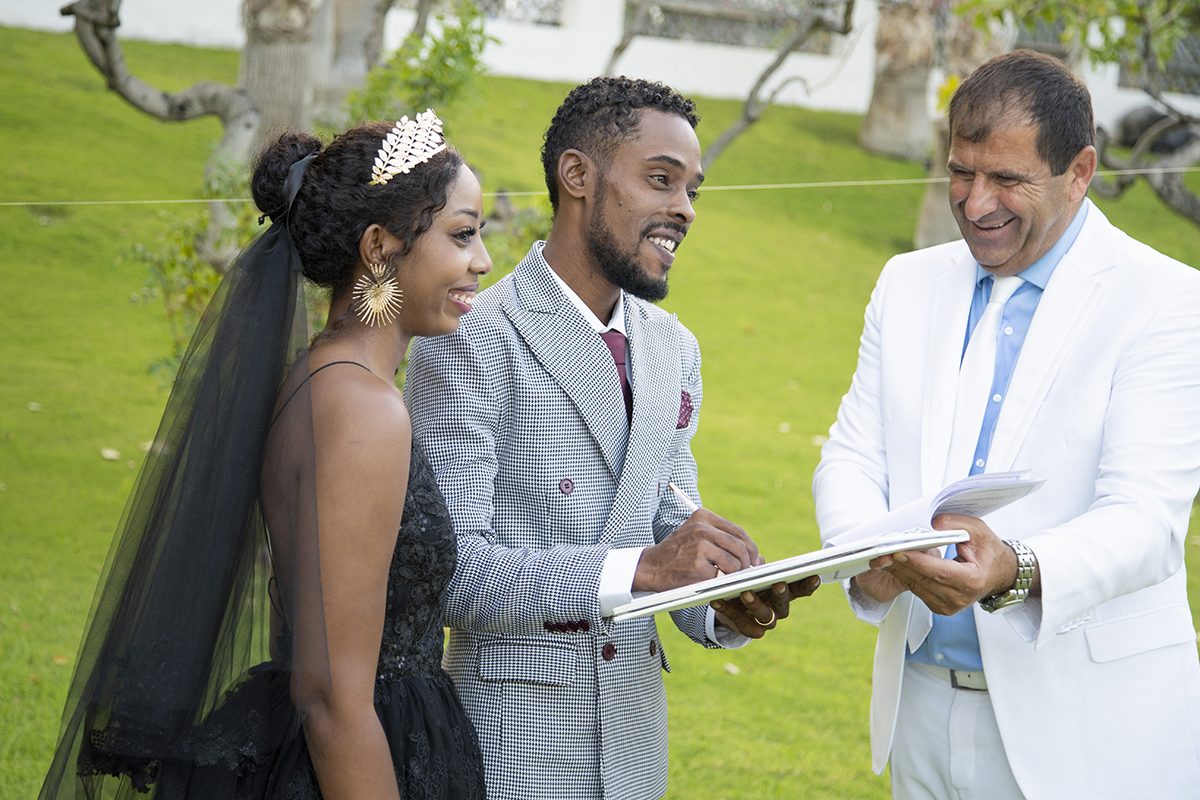 Couple signing the wedding register