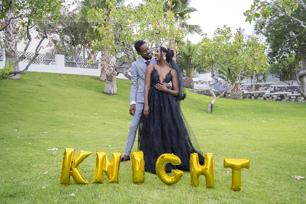 Illuminated letters at a garden wedding