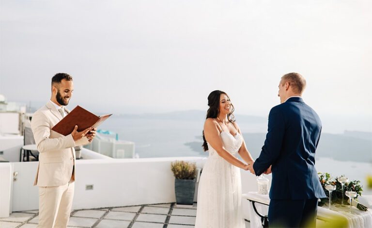 Wedding ceremony held on a hotel balcony in Santorini