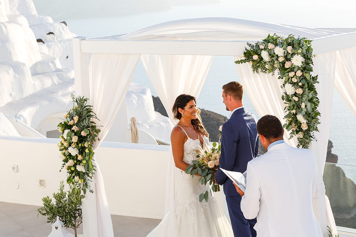 Bride and groom photographed at their Santorini wedding