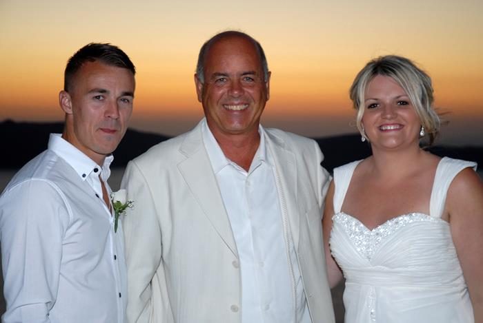 Nikos, wedding planner, at work in Santorini
