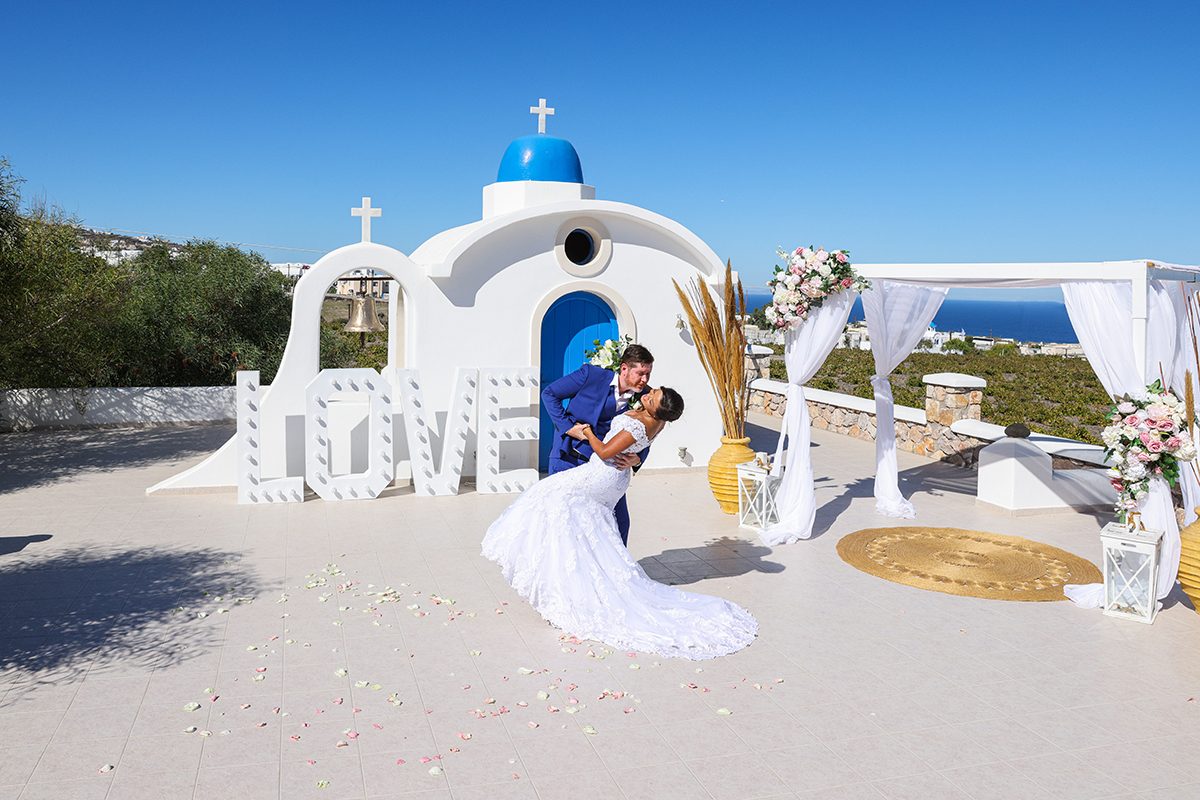 Blue-domed chapel venue dressed with a decorated gazebo
