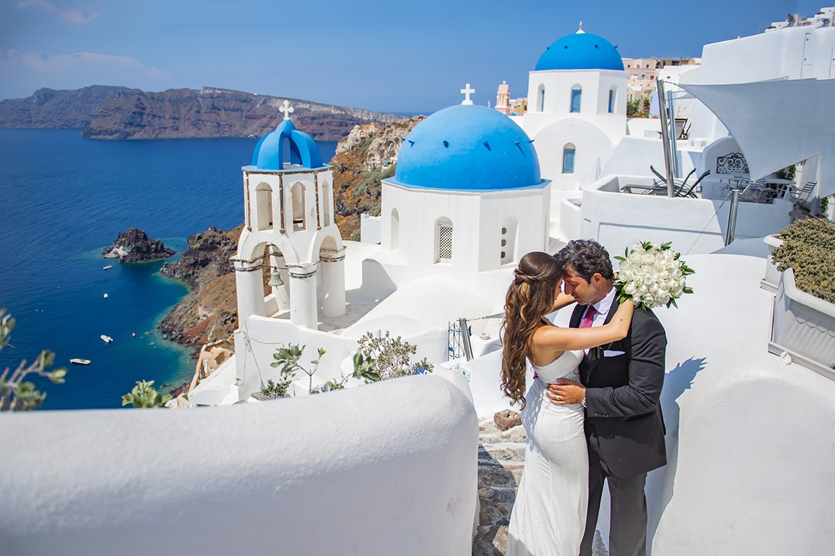 Elopement ceremony for two on the edge of the Santorini caldera