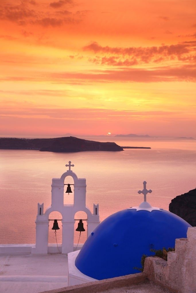 Sunset by the blue-domed chapel