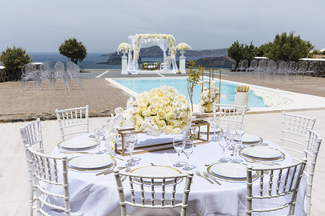 Venue terrace with chairs beside the pool